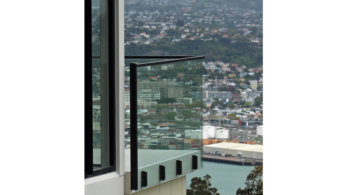 Edgetec JH Clamp Frameless Glass Balustrade with Interlinking Rail connected to balustrade post2