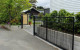 Classic Series Gate System on a modern home with automated opening and closing