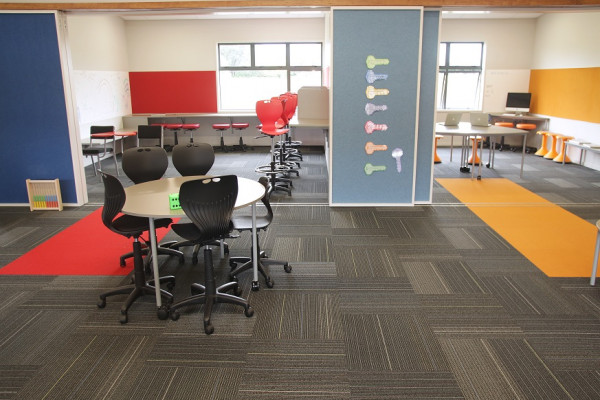 Jacobsen’s Colourful Carpet Tiles Creatively Delineate Learning Spaces
