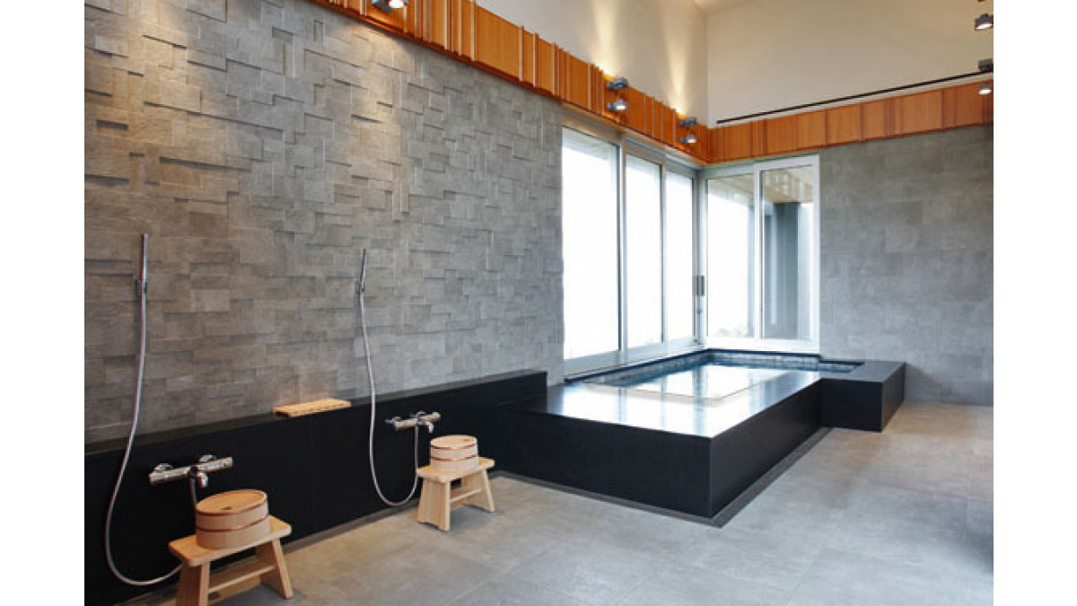 The Ofuro room follows the Japanese format of pre-bathing fixtures before immersion in a hot tub.