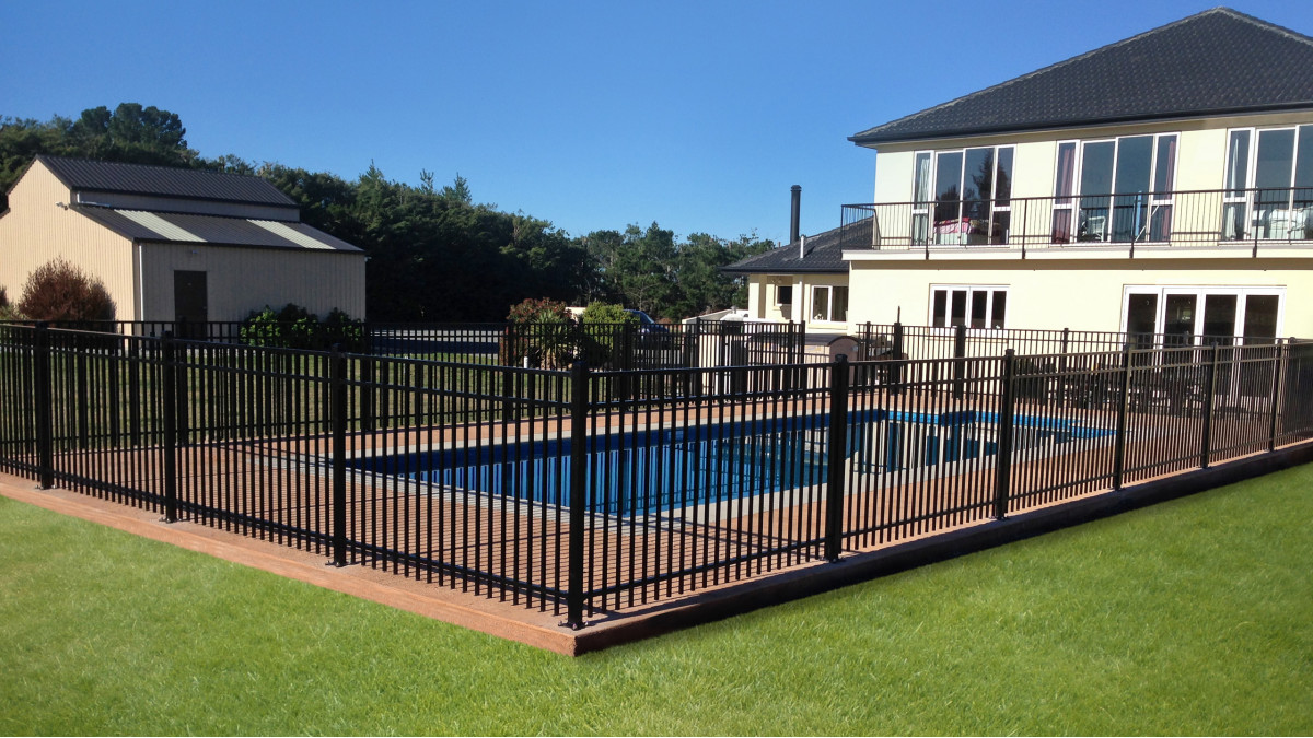 Contemporary Fencing installed as regulation pool fencing on separate pool.