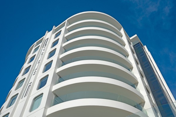 Achieving Curved Glass Balustrades for Oceanside Tower