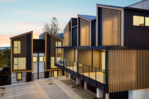 Woodgrain Coated Aluminium Louvres Keep Maintenance to a Minimum for 10-Home Development